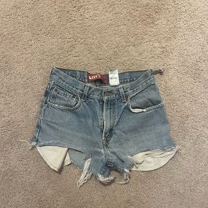 Vintage Levi’s shorts would fit size 26
